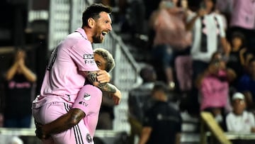 Inter Miami's Argentine forward Lionel Messi (L) celebrates scoring his team's third goal  with Inter Miami's Venezuelan forward Josef Martinez during the round of 32 Leagues Cup football match between Inter Miami CF and Orlando City SC at DRV PNK Stadium in Fort Lauderdale, Florida, on August 2, 2023. (Photo by CHANDAN KHANNA / AFP)